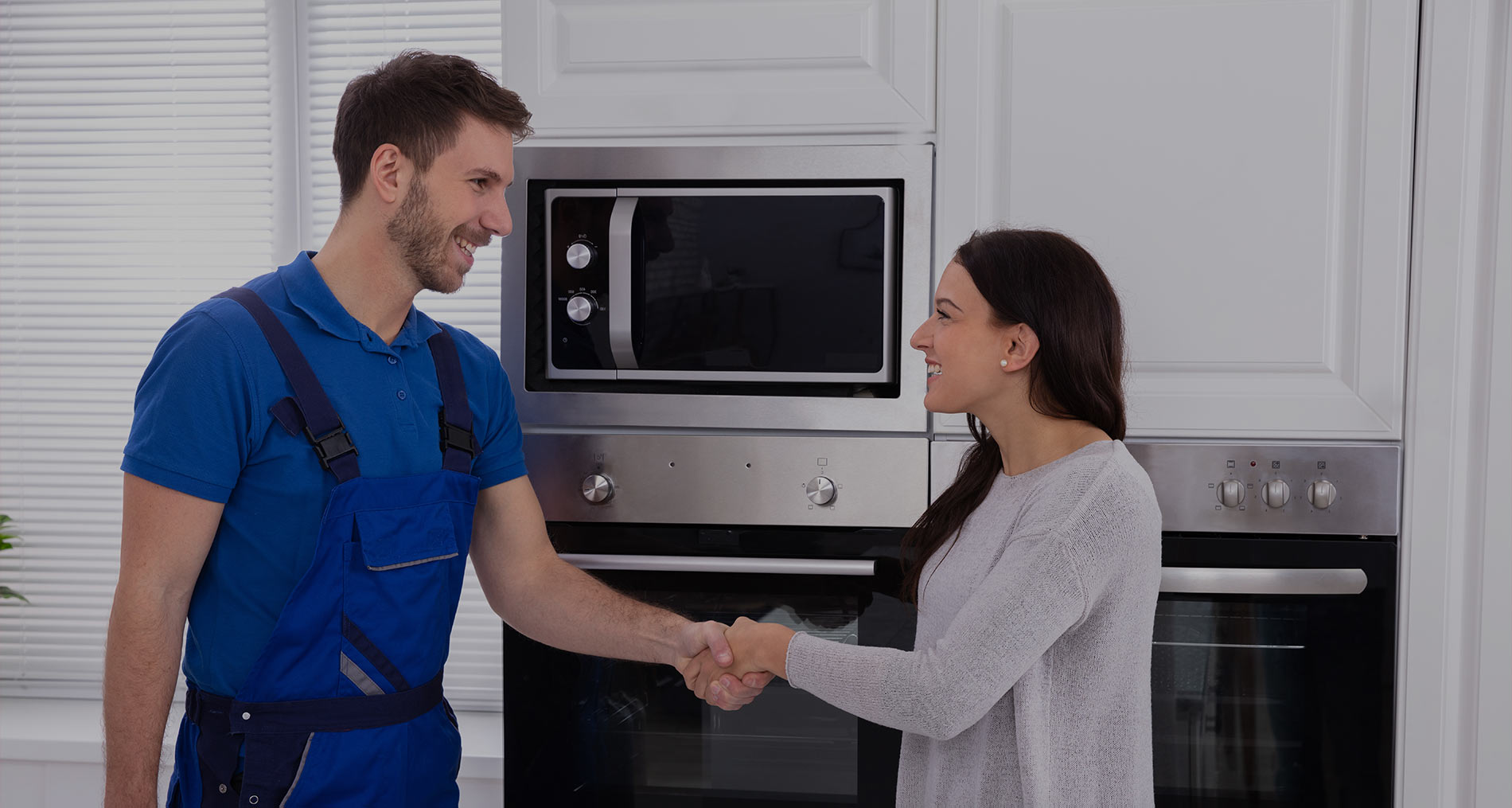 Professional appliance technician at work